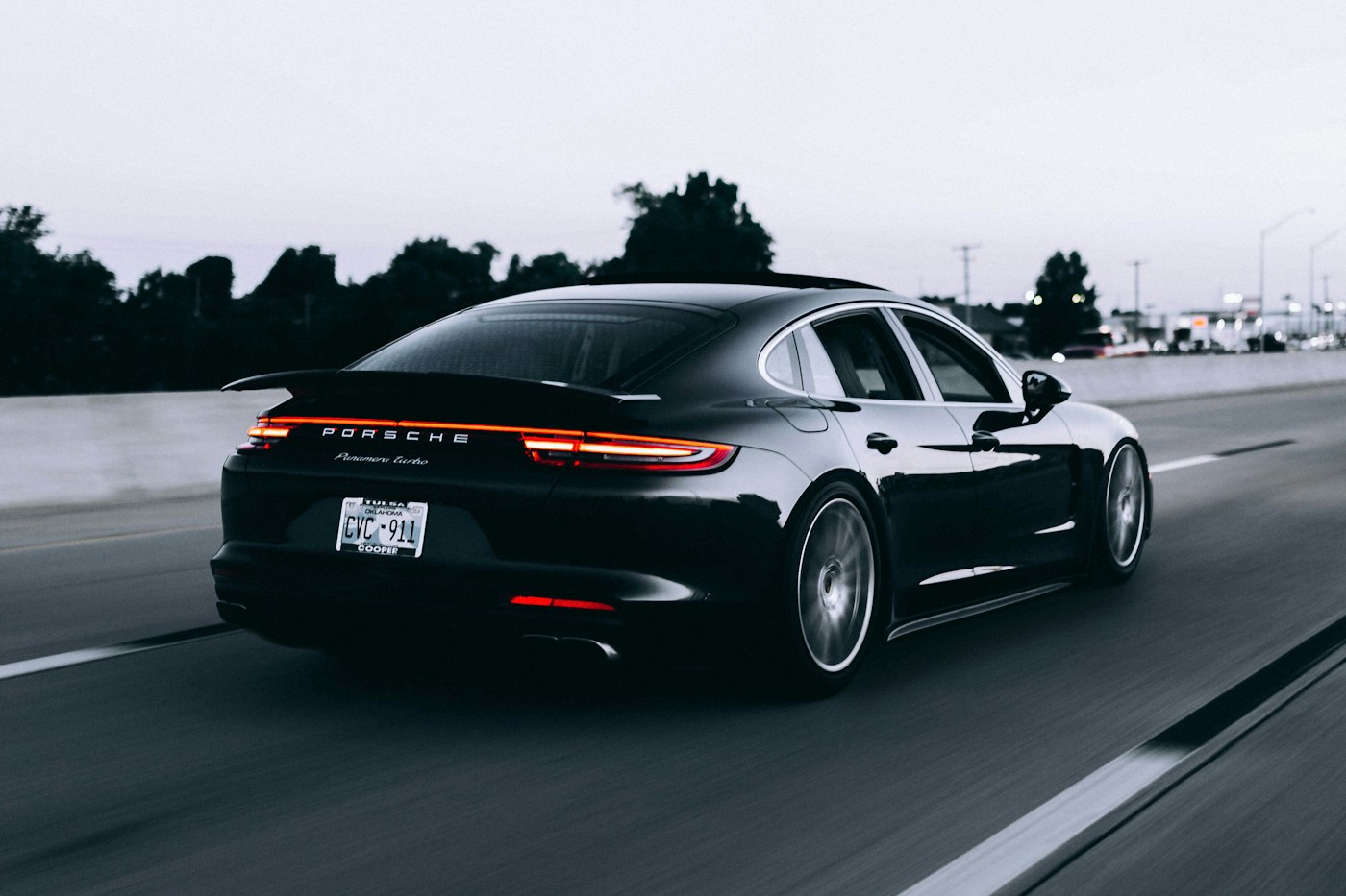 Silver sports car on an open road